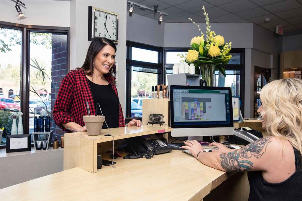 woman buying NJ weed at cannabis dispensary near me in New Jersey