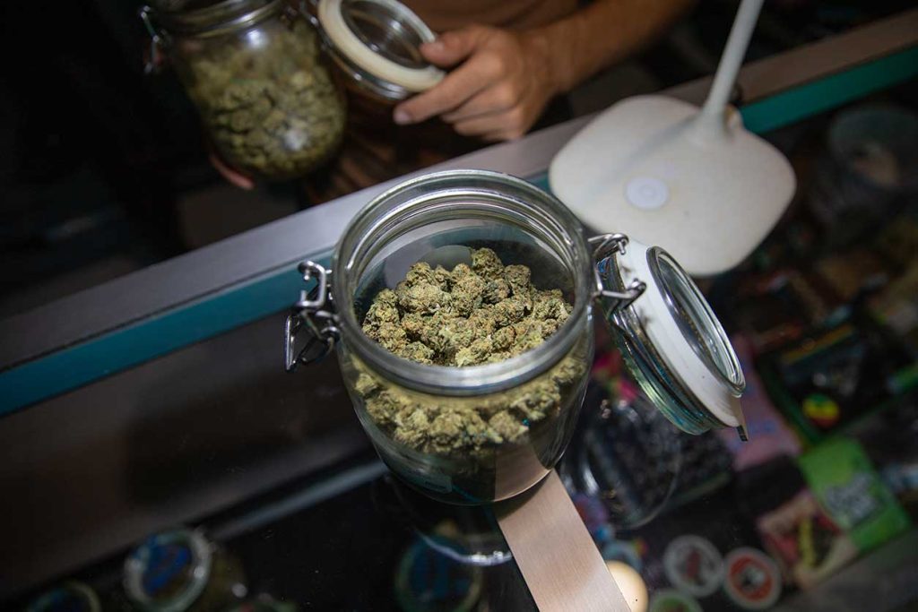 An open jar of fresh nj weed buds from a weed dispensary near me in new jersey