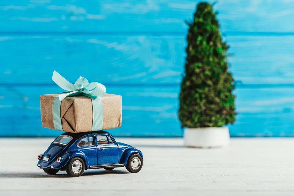 Small blue cannabis delivery car in New Jersey