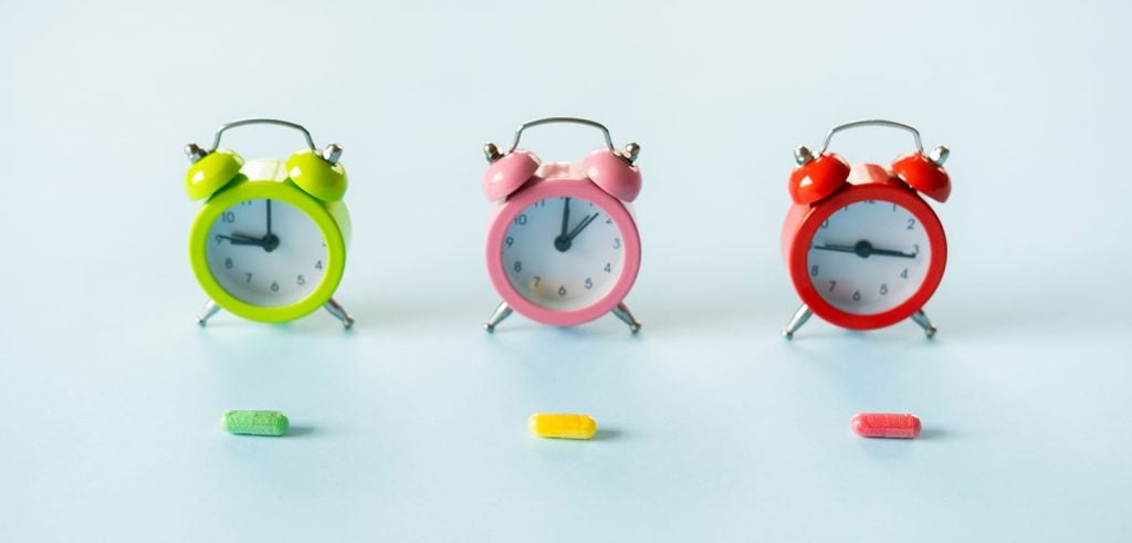 Concept with clocks and weed gummies for how long do gummies last.