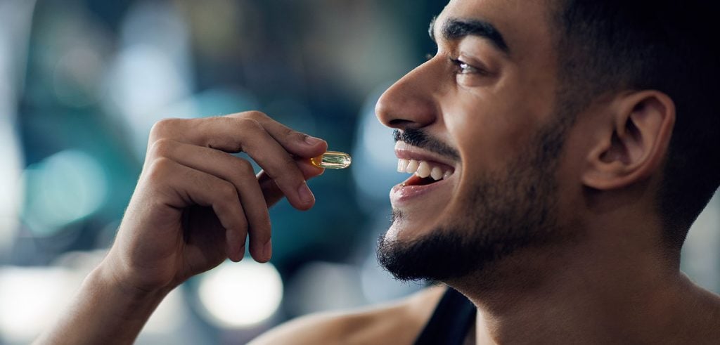 New Jersey man eating a weed gummy from Hello High weed delivery dispensary near me.